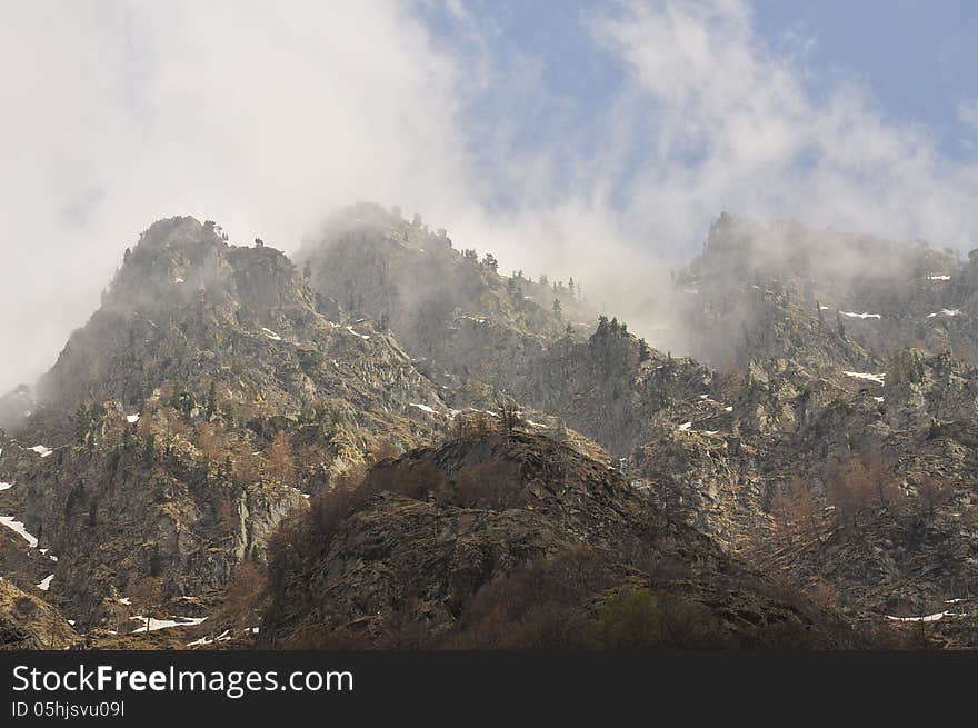 Alpine peaks and fog in the maritime Alps, Italy. Alpine peaks and fog in the maritime Alps, Italy