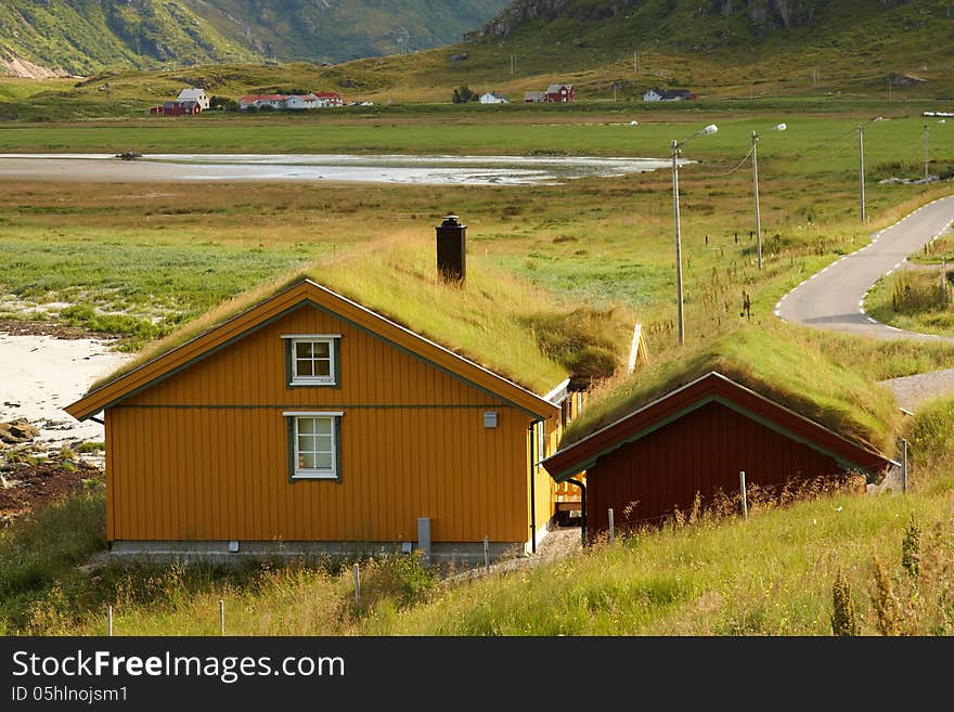 Houses with typical sod roof on Lofotten islands in Norway. Houses with typical sod roof on Lofotten islands in Norway