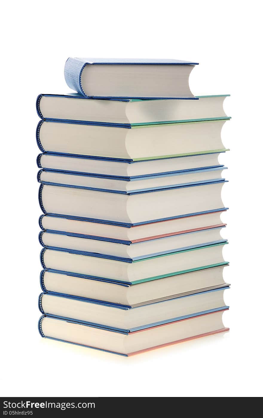 Books in bright colors arranged vertical