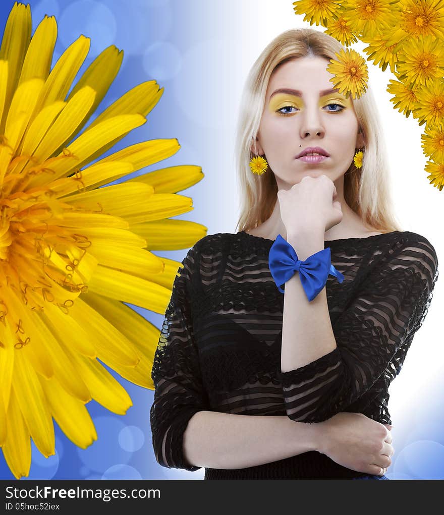 Beautiful blonde with flowers in hairstudio shot. Beautiful blonde with flowers in hairstudio shot