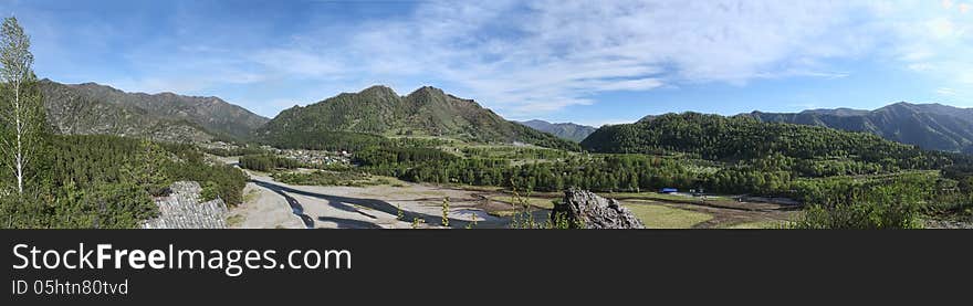 Panorama of a mountain on a dried lake in Altai mountains