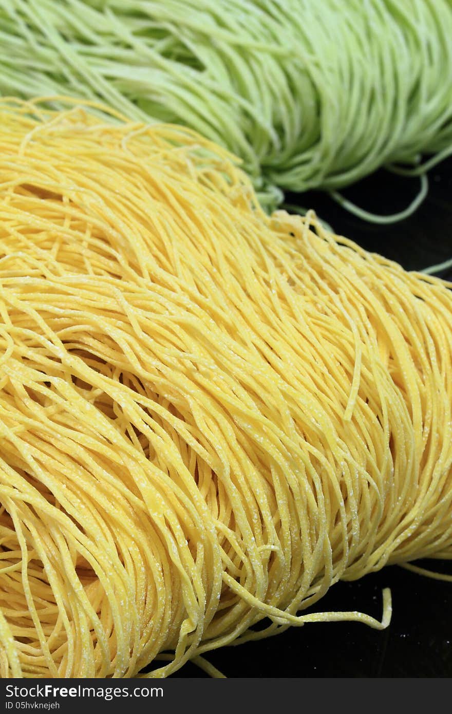 Yellow and green chinese noodle