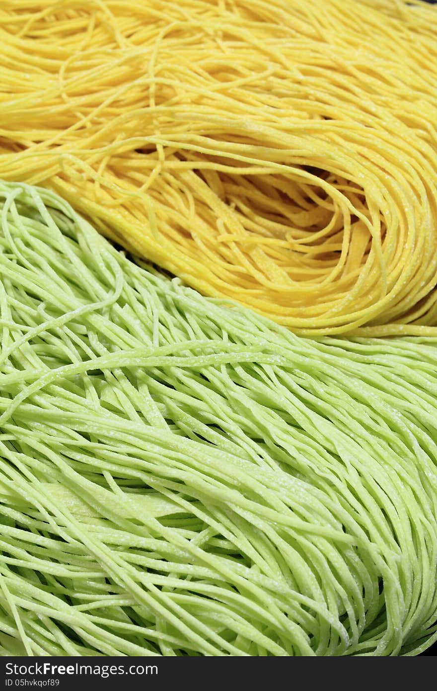 Yellow and green chinese noodle