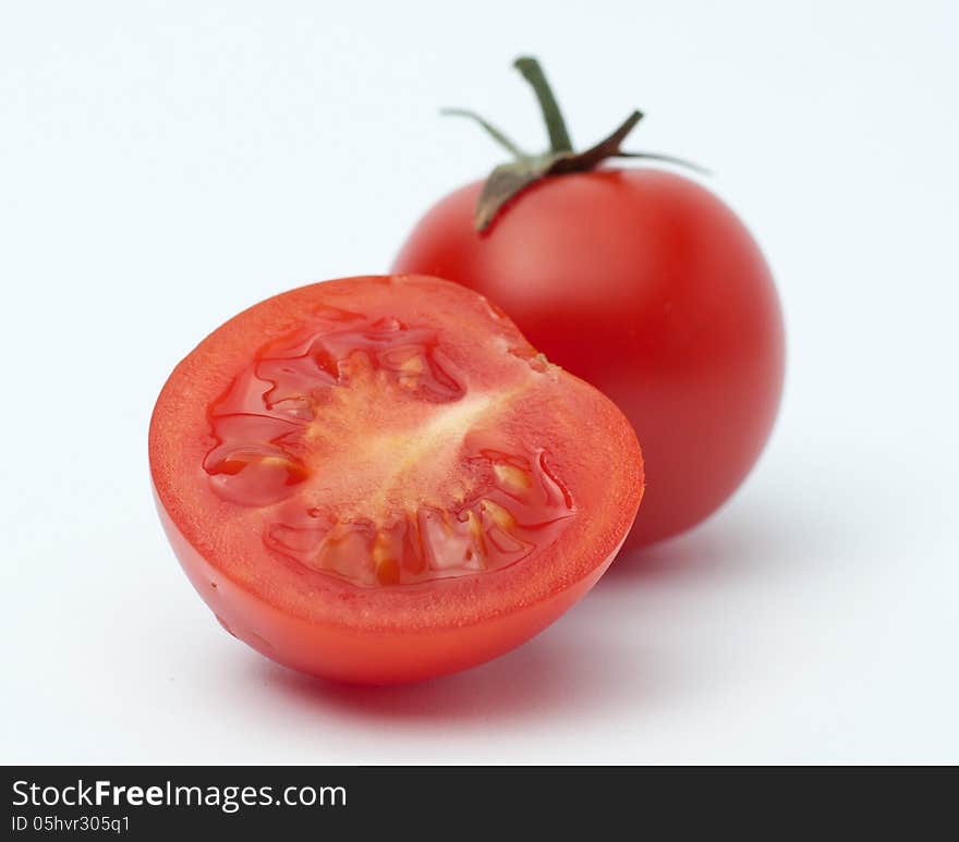 Tomatos on a white background. Tomatos on a white background