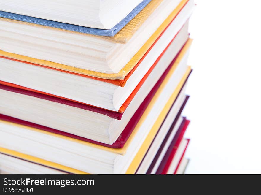 Stack of books on a white background. Stack of books on a white background