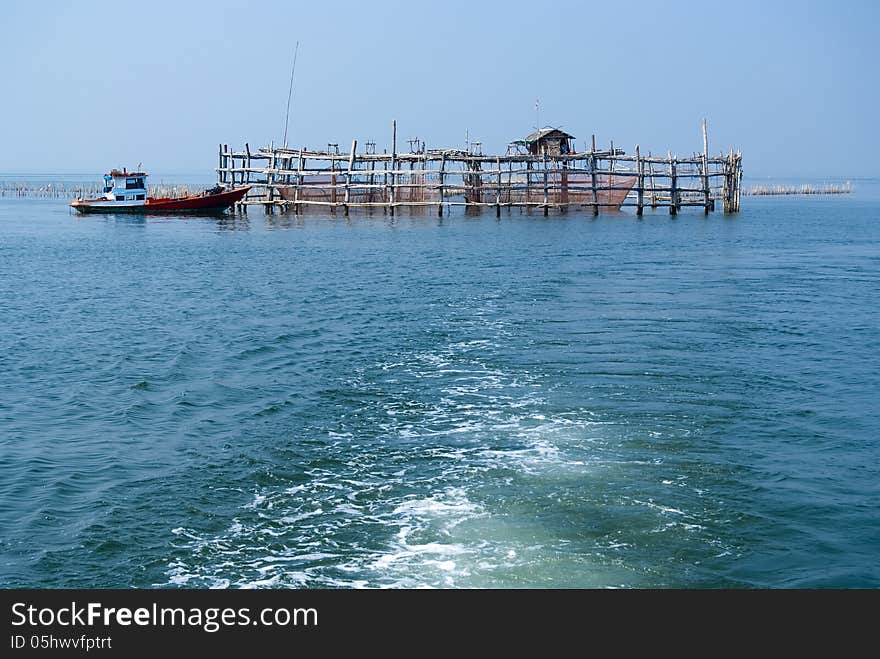 Trap net/stake trap at the mouth of the Mae Klong river to the Gulf of Thailand in Samutsongkram. Trap net/stake trap at the mouth of the Mae Klong river to the Gulf of Thailand in Samutsongkram