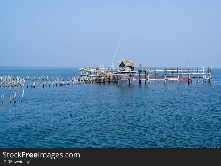 Trap net/stake trap at the mouth of the Mae Klong river to the Gulf of Thailand in Samutsongkram. Trap net/stake trap at the mouth of the Mae Klong river to the Gulf of Thailand in Samutsongkram