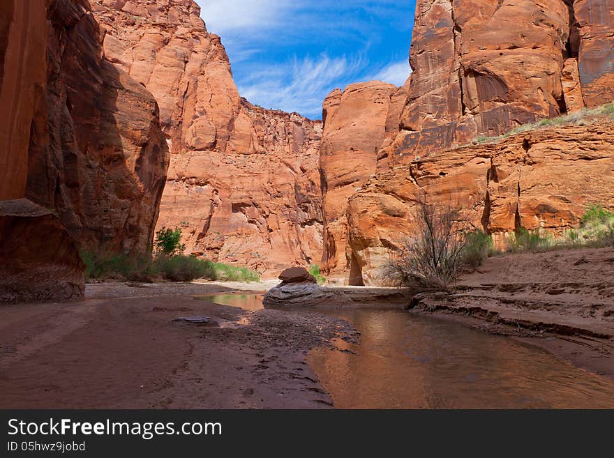 The Paria Canyon is located in Arizona and Utah, and is a 38 mile long canyon trip by means of backpacking. One makes thousands of stream crossings in this spectacular area, until the canyon widens out and ends in Lee's Ferry, Arizona.