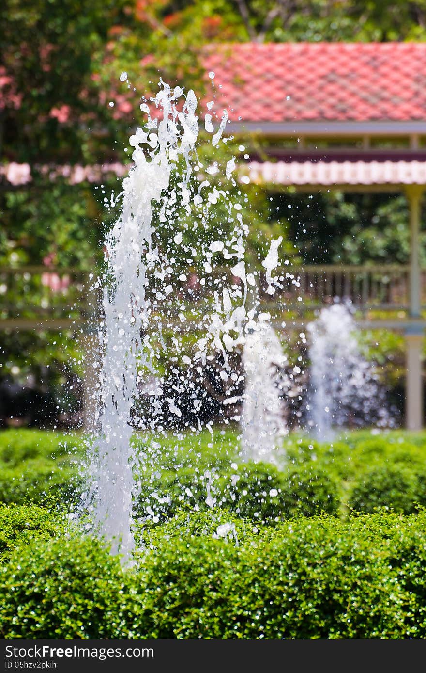 Stack of garden fountains in villa field