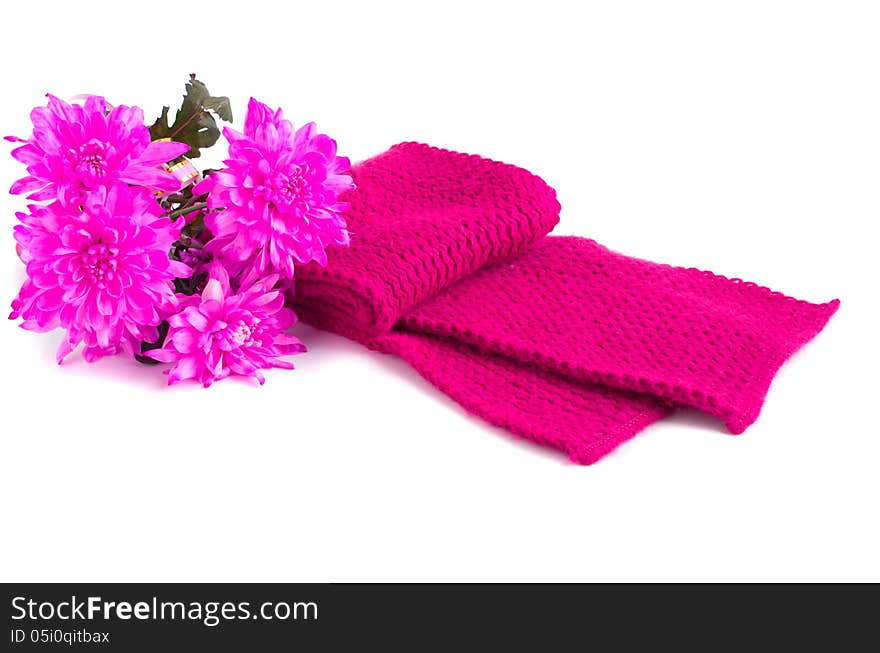 Crimson scarf and a bouquet of flowers