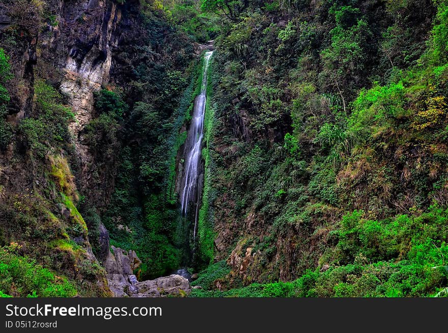 Deep forest beautiful waterfall landscape view, Nepal. Deep forest beautiful waterfall landscape view, Nepal