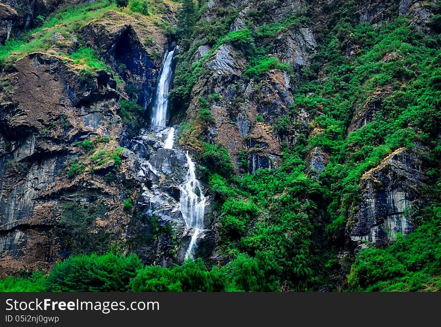 Tropical mountain landscape waterfall, Himalayas area, Nepal