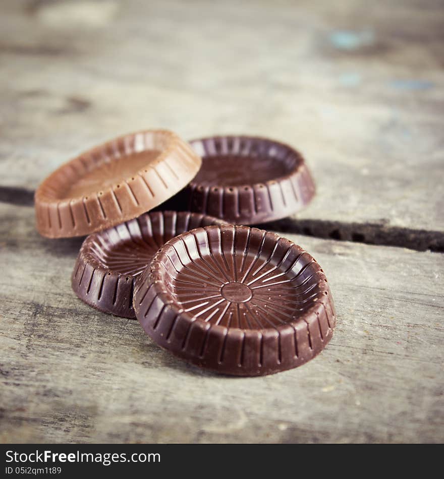 Chocolate bars on old wooden table. Chocolate bars on old wooden table