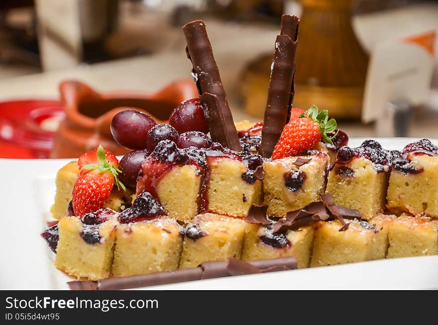 Fruit cake on a white plate