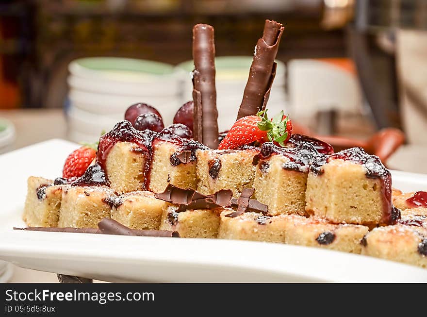 Fruit cake on a white plate