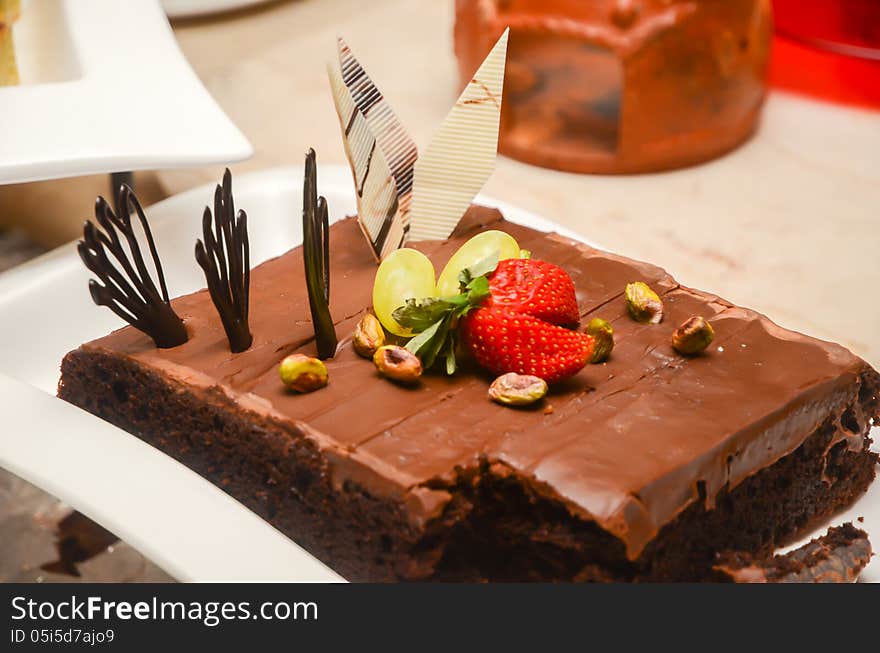 Chocolate cake on a white plate