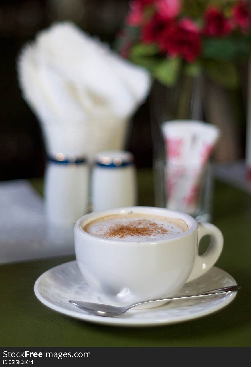 Cup of cappuccino with saucer. Cup of cappuccino with saucer