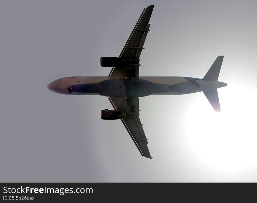 Airplane at takeoff seen from the bottom. Airplane at takeoff seen from the bottom