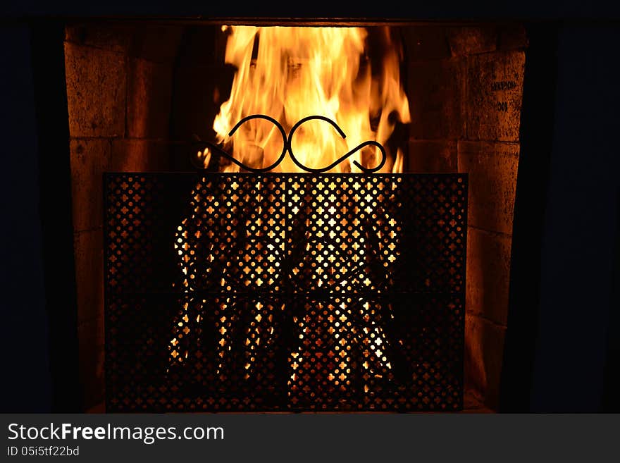 Fireplace burns with full flame