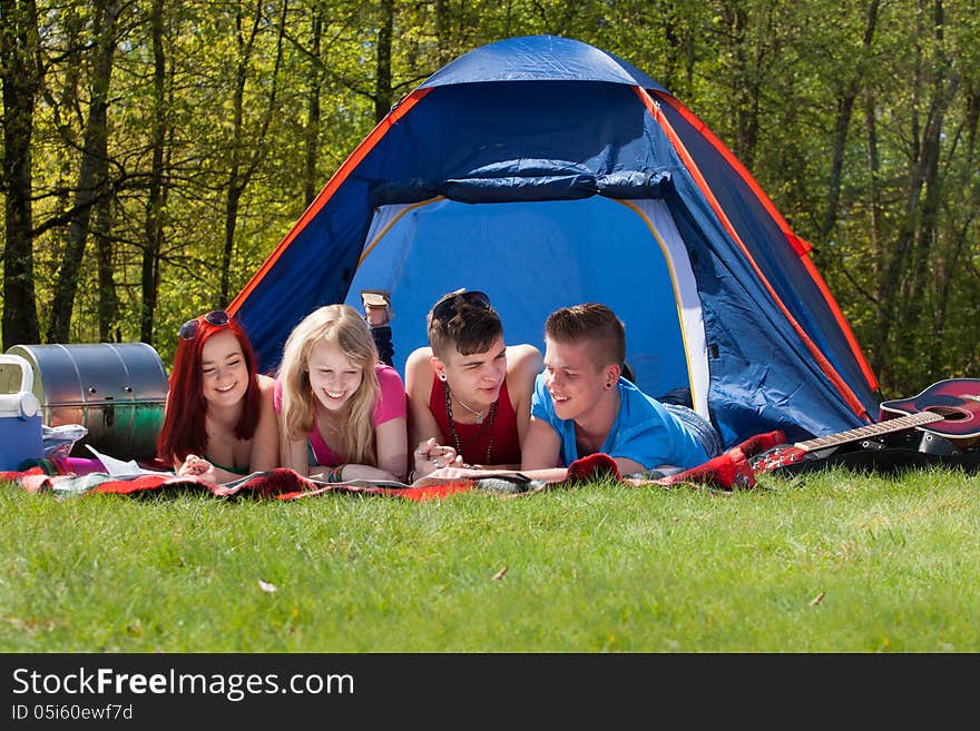 Young teenager group are having their holliday on a camping. Young teenager group are having their holliday on a camping