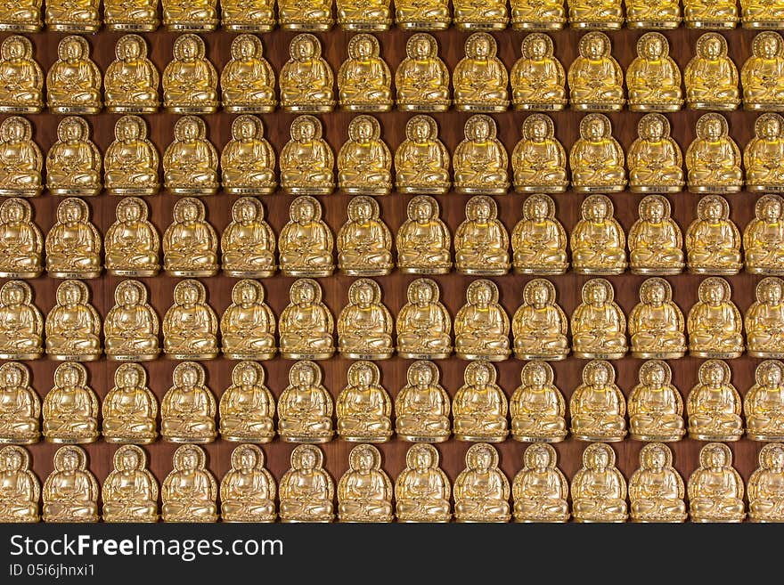 Million of golden Buddha statue in chinese temple Nonthaburi,Thailand.