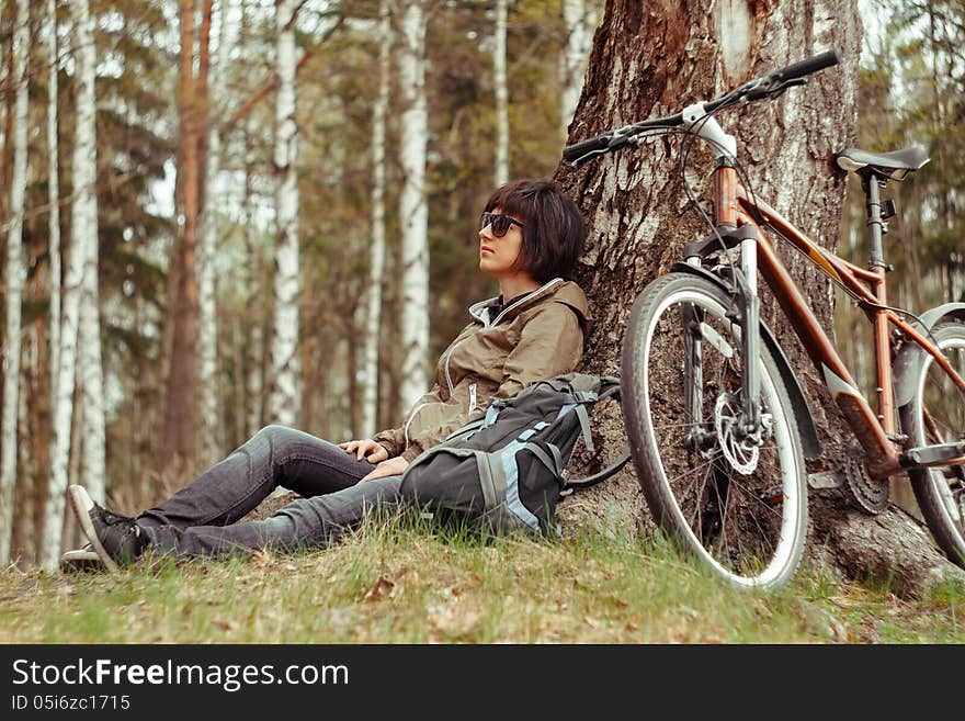 Young woman sitting on nature