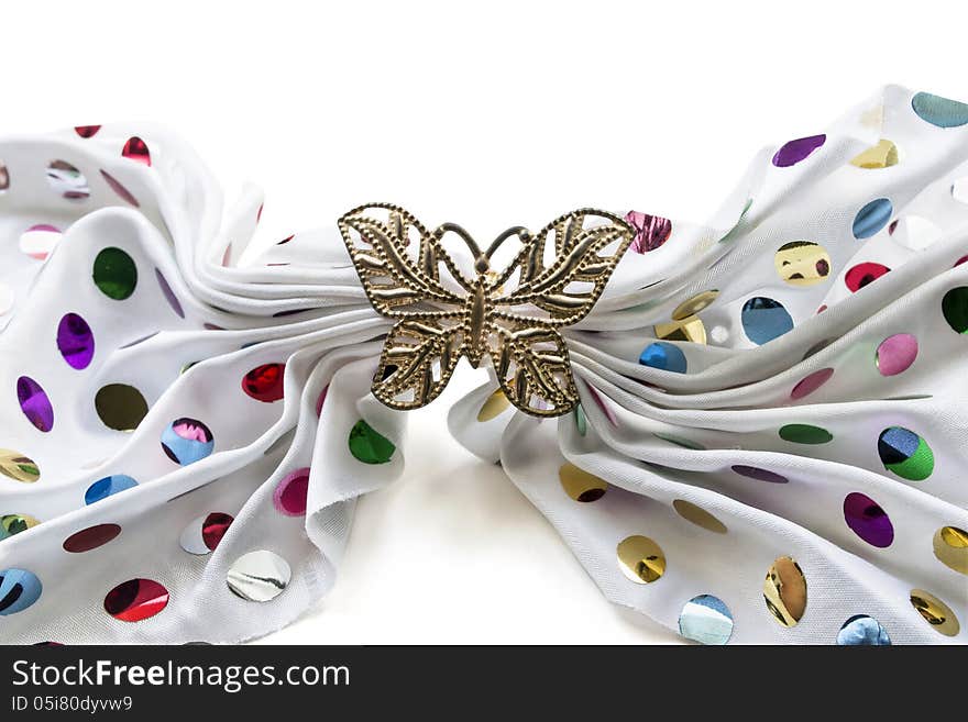 White silk kerchief decorated with multicolor paillettes and golden barrette butterfly. White silk kerchief decorated with multicolor paillettes and golden barrette butterfly