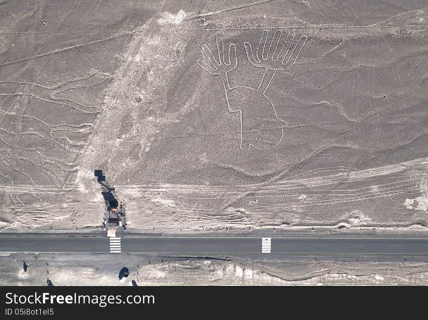 Drawing the hands of the Nazca lines in Peru (South America)