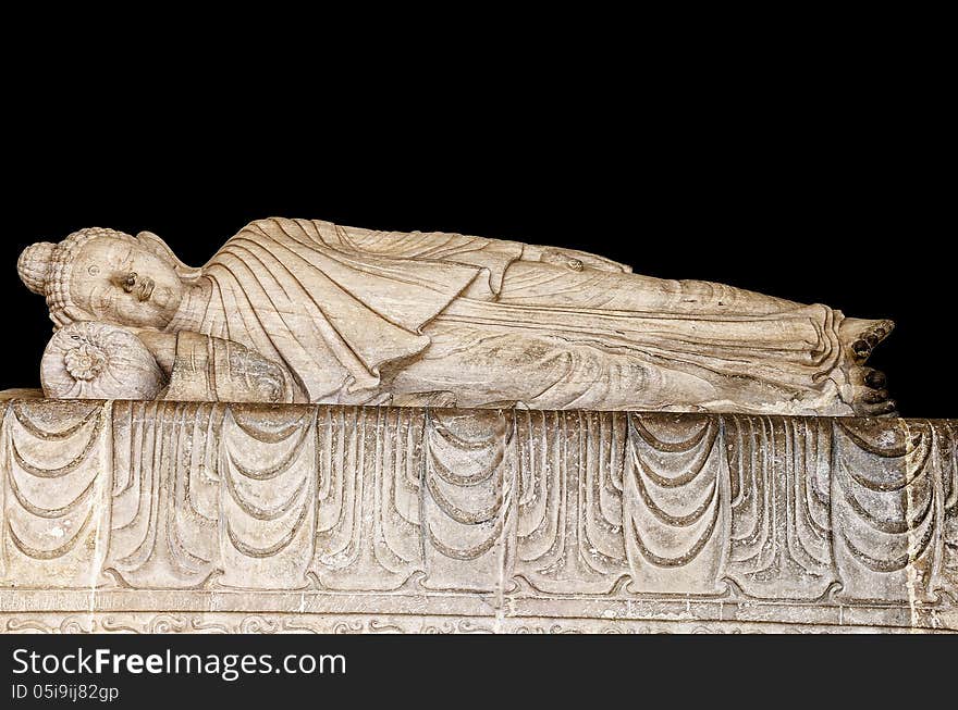 Statue of sleeping Buddha in a Buddhist Temple.