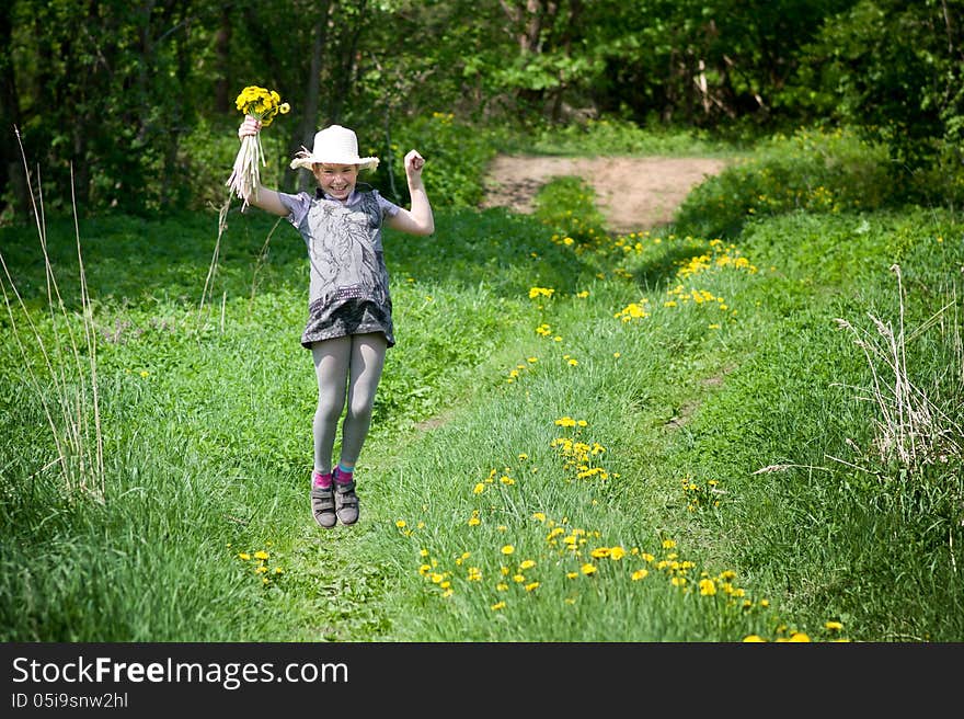 Girl with dandelions up air