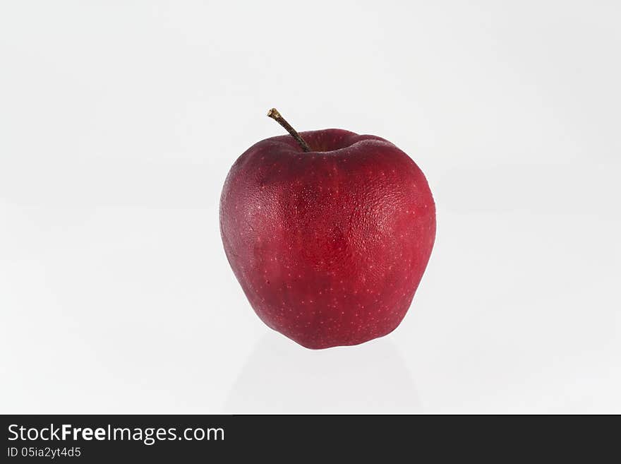 Ripe red apple. Isolated on a white background.