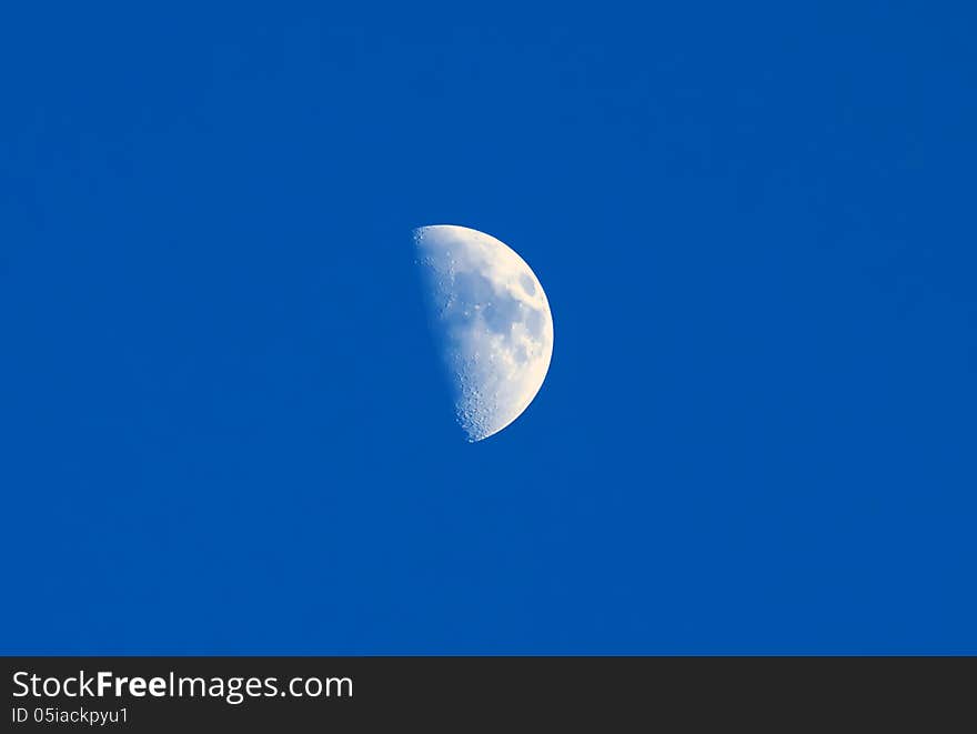 Moon on the blue sky