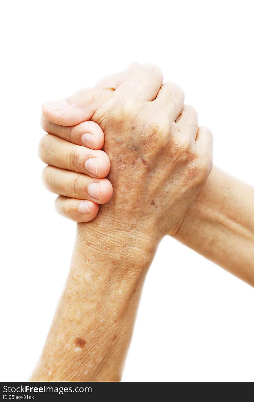 Woman hand and old woman hand ,Two coupled hands isolated on white background. Woman hand and old woman hand ,Two coupled hands isolated on white background