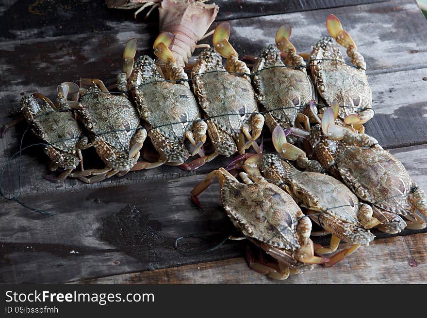 Grey crabs in a market