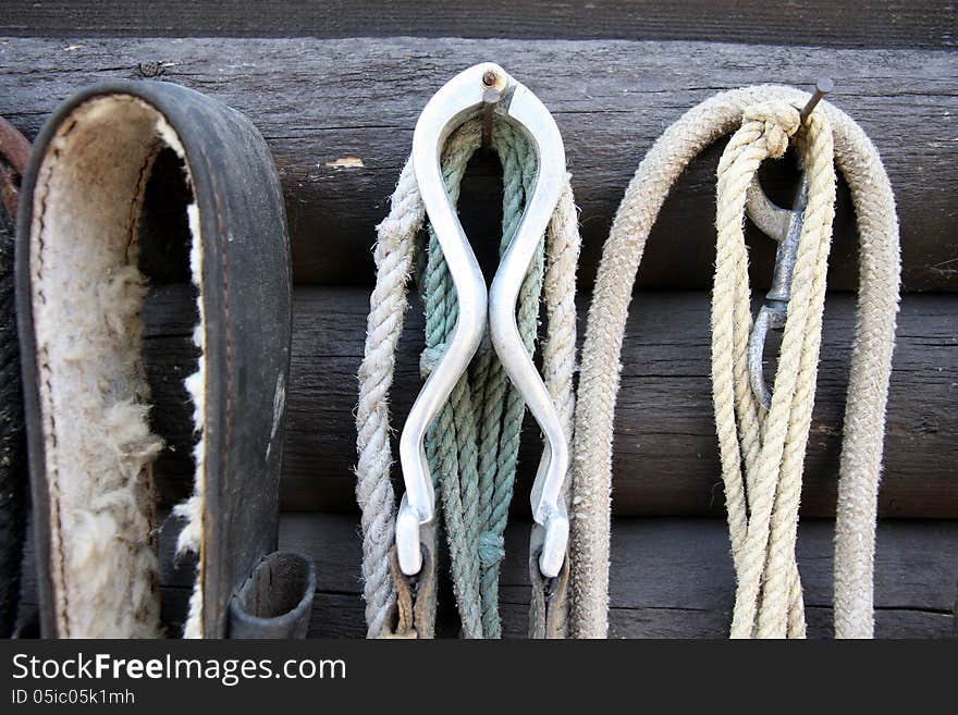 Details of diversity used horse reins, background the log cabin