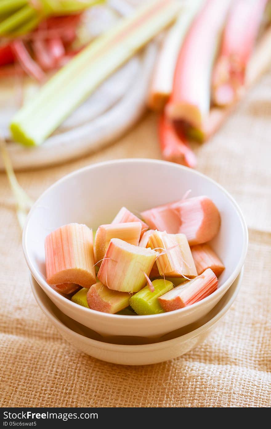 Ready fresh raw rhubarb cut in a bowl