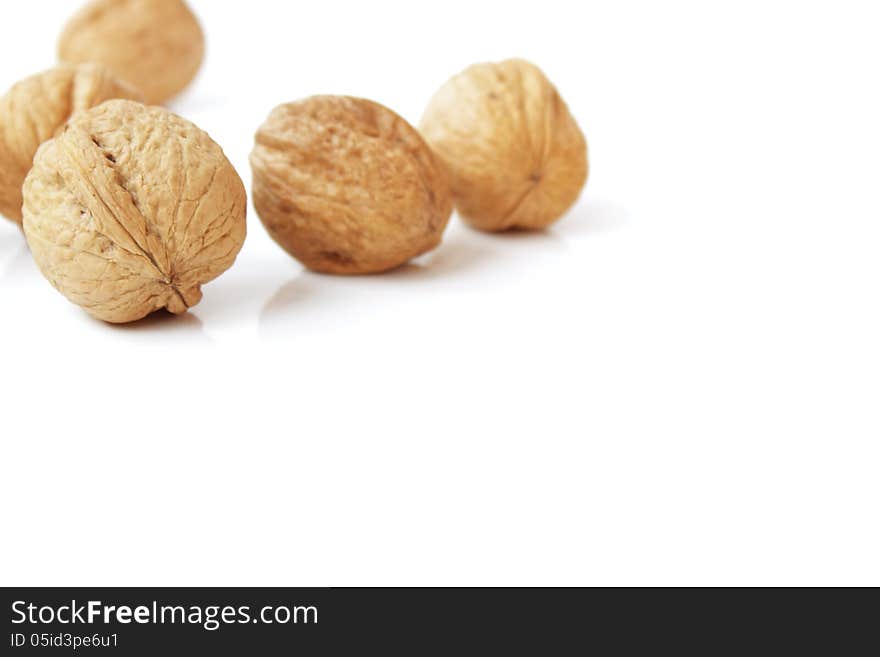 Walnuts on a white background