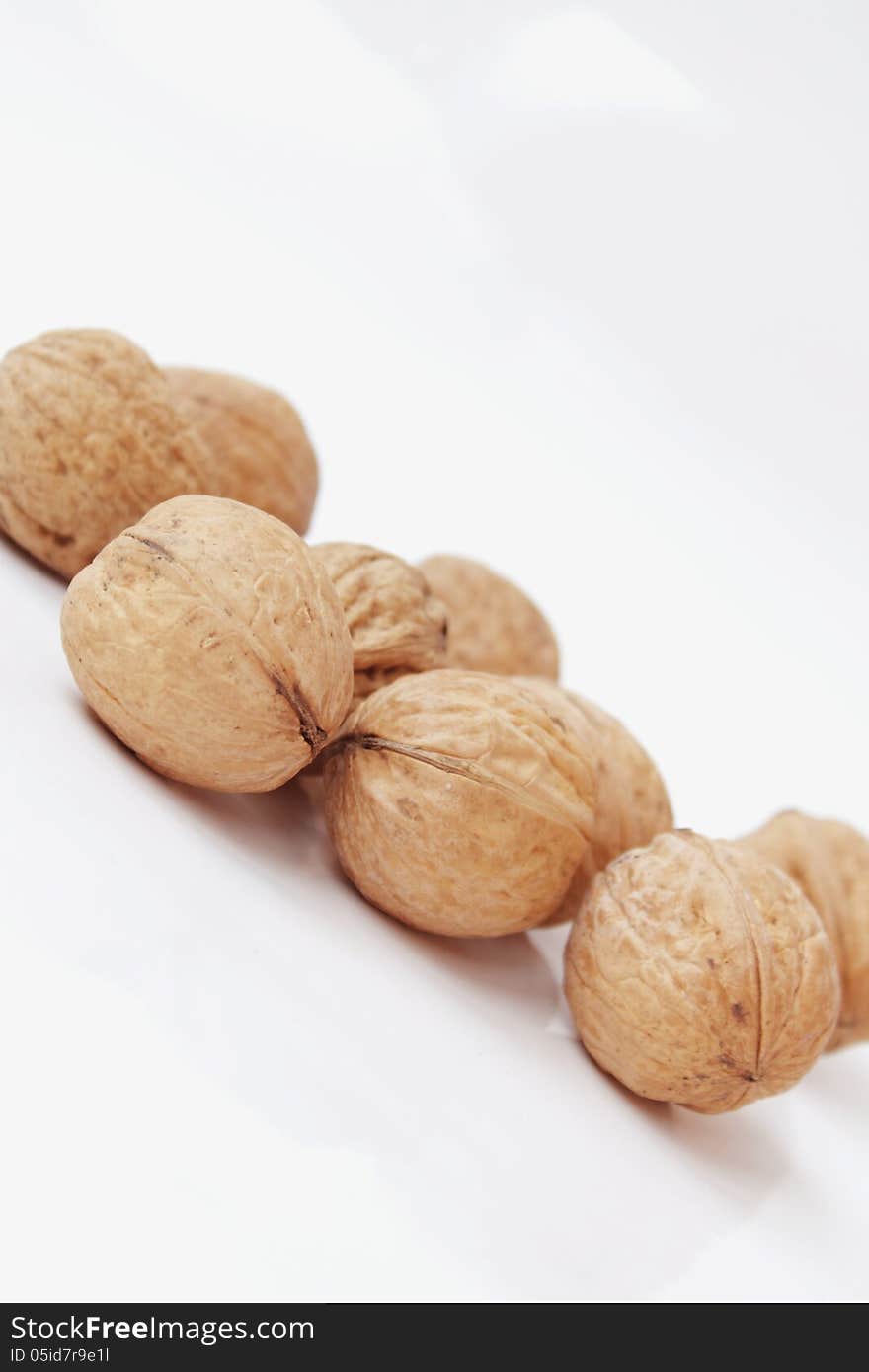 Walnuts on a white background