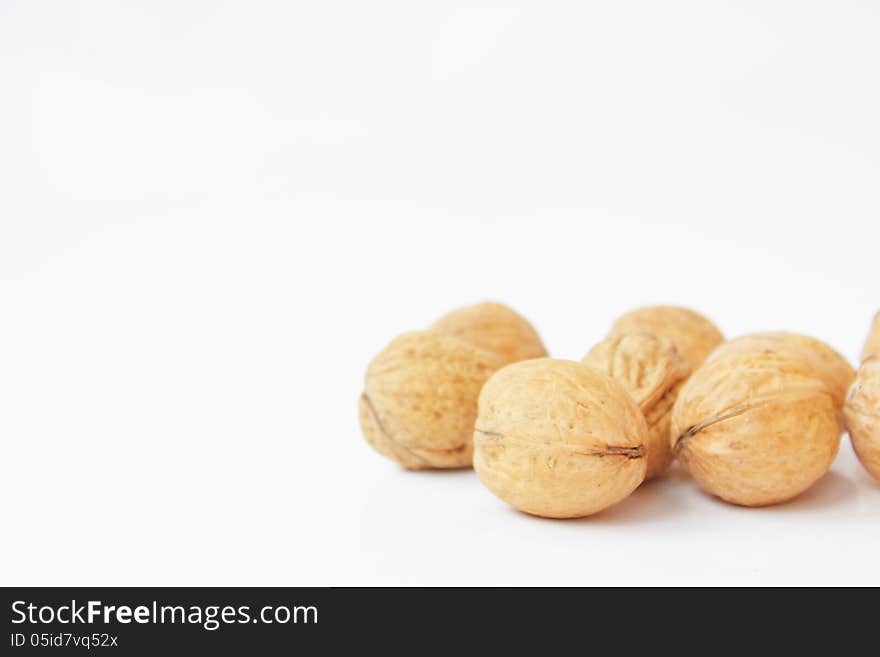 Walnuts on a white background