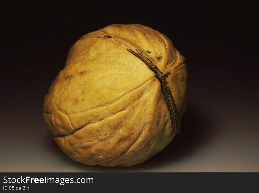 Walnuts on a dark background