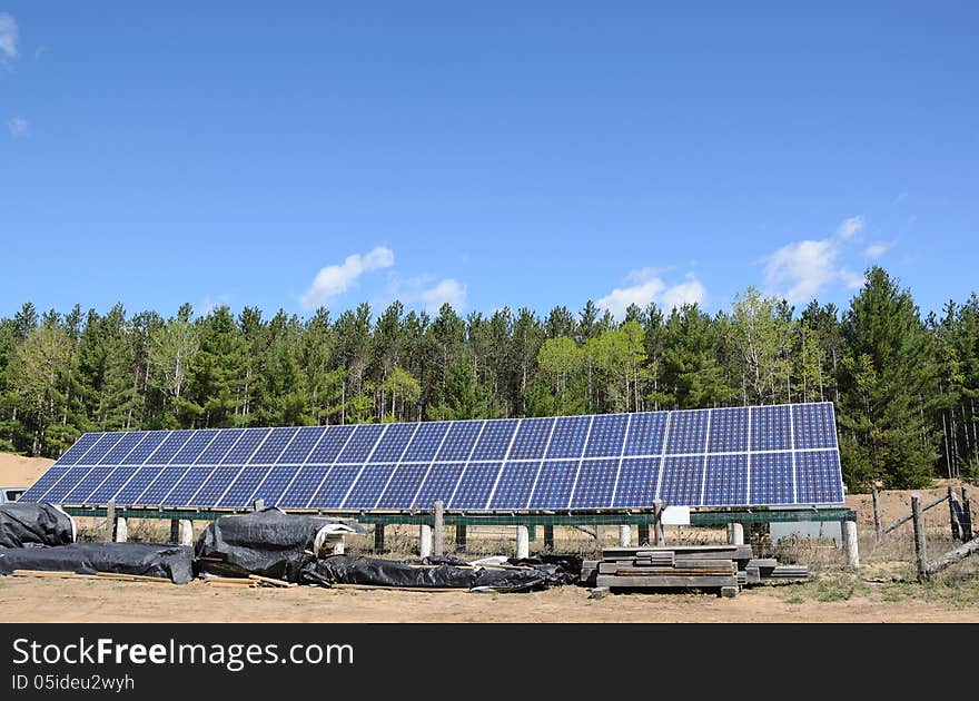 Solar panels under blue sky. Solar panels under blue sky