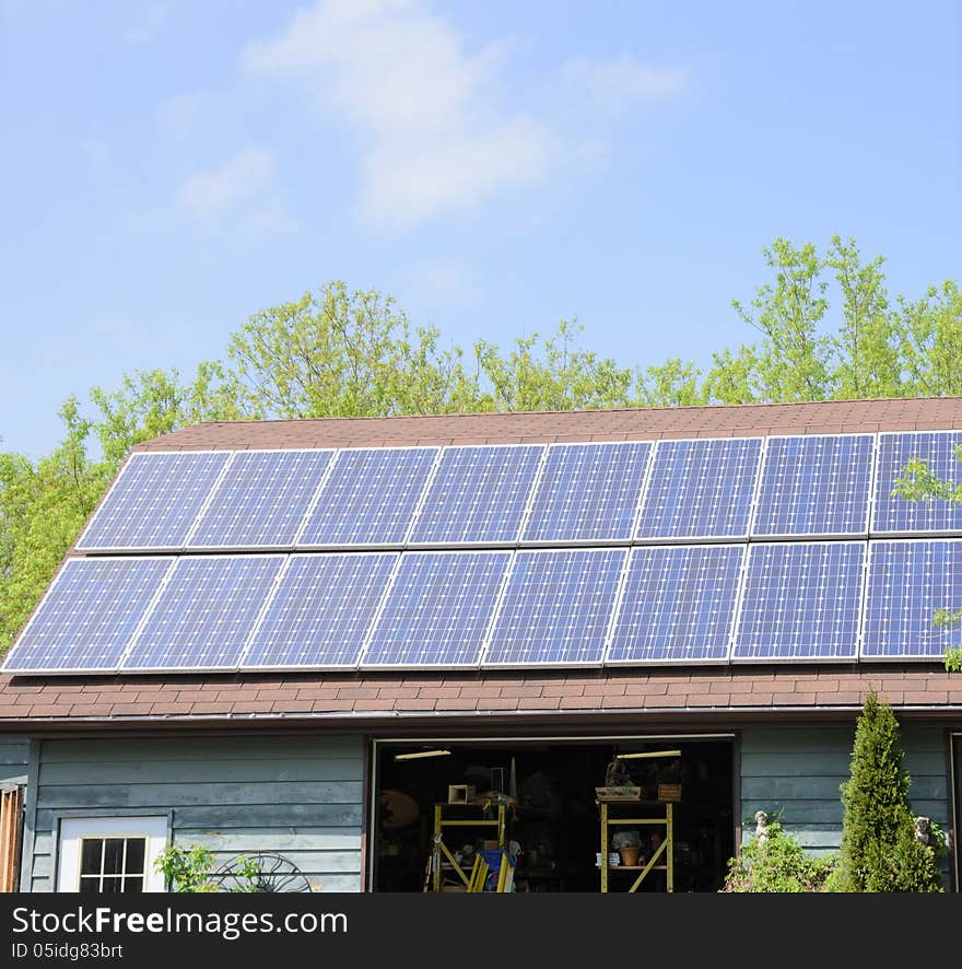 Solar panels installed on rural outbuilding. Solar panels installed on rural outbuilding