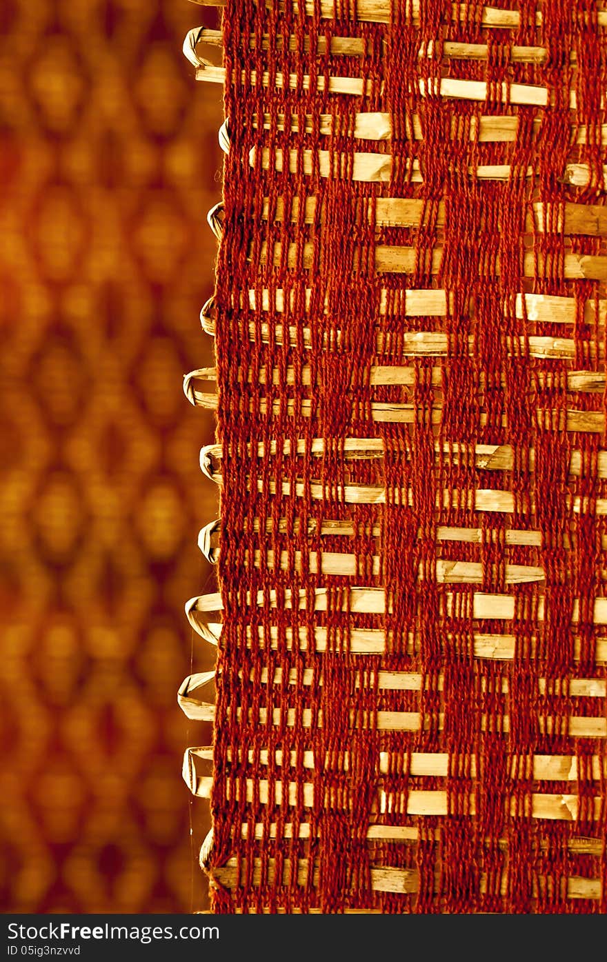 Detail of handwoven fabric made in hand-loom using natural fibers and cotton thread. Detail of handwoven fabric made in hand-loom using natural fibers and cotton thread