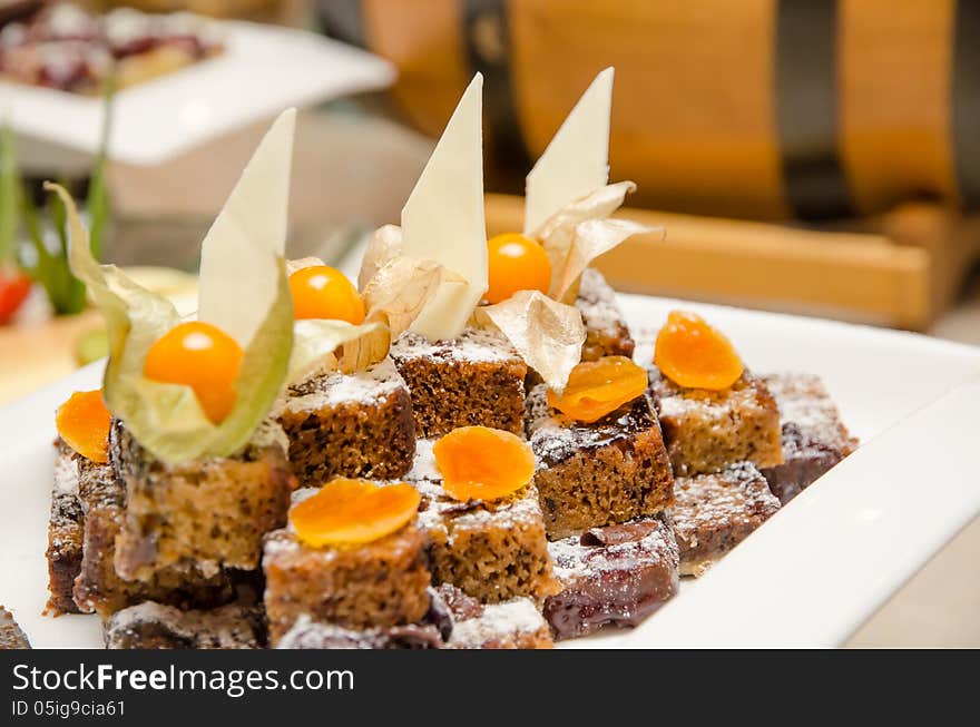 Slices of Fruit cake on a white plate