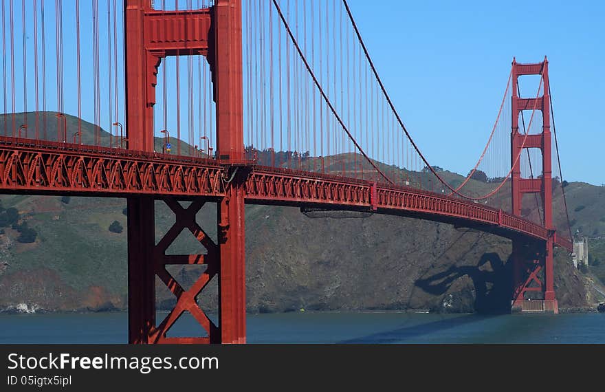 The Golden Gate Bridge is a suspension bridge spanning the Golden Gate, the opening of the San Francisco Bay into the Pacific Ocean. As part of U.S. Route 101 and California State Route 1, the structure links the city of San Francisco to Marin County. It is one of the most internationally recognized symbols of San Francisco.