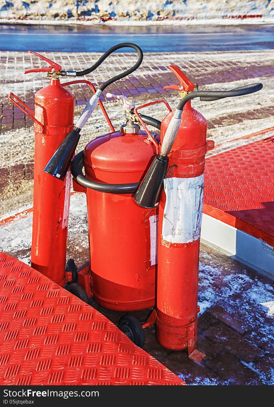 Fire extinguishers at gas station. Vitebsk. Belarus. Febriary 2013. Fire extinguishers at gas station. Vitebsk. Belarus. Febriary 2013.