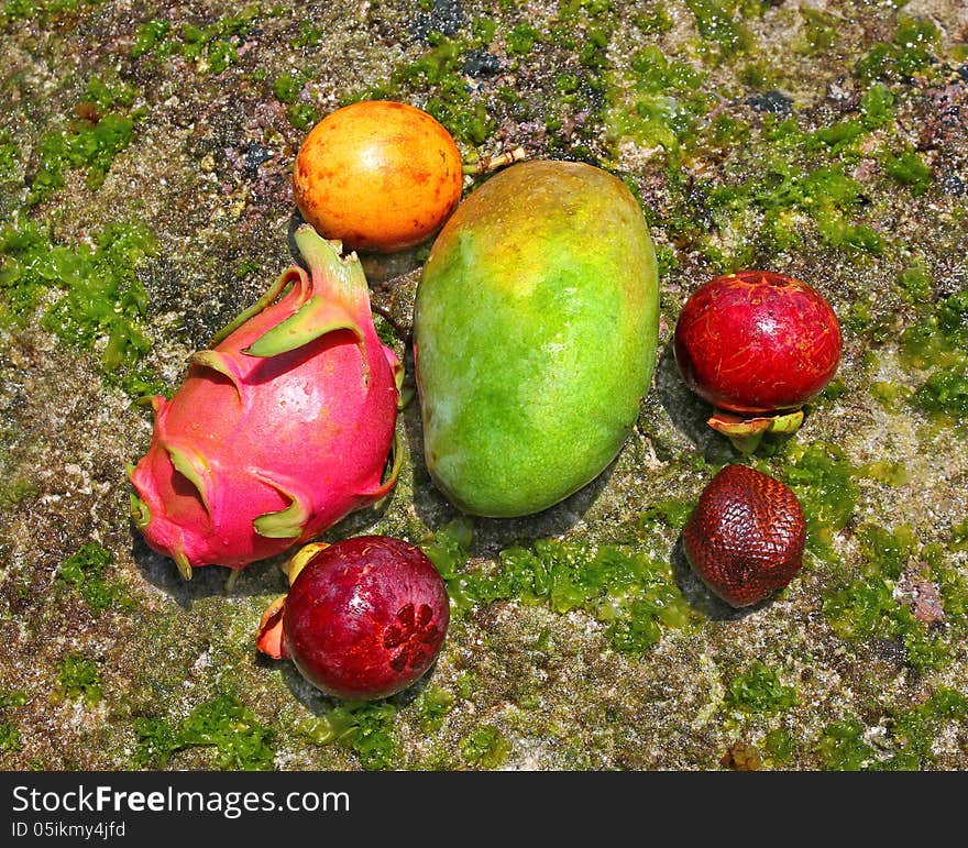 Fresh exotic fruits on natural background. Fresh exotic fruits on natural background