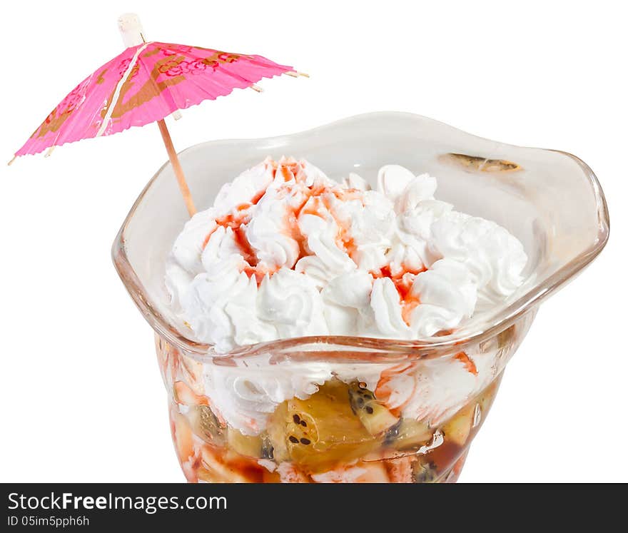 Daily Hawaiian fruit cocktail with pineapple and kiwi fruit and sweet whipped cream in transparent bowl isolated on white background. Daily Hawaiian fruit cocktail with pineapple and kiwi fruit and sweet whipped cream in transparent bowl isolated on white background