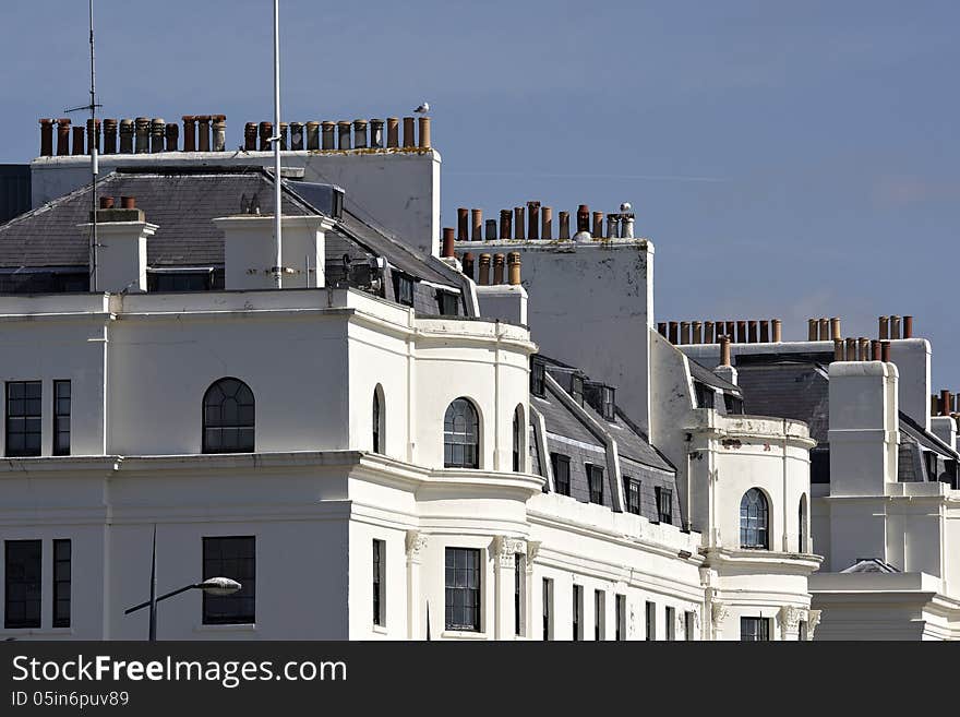 Rows of multiple chimneys on buildings on Dover sea front. Rows of multiple chimneys on buildings on Dover sea front