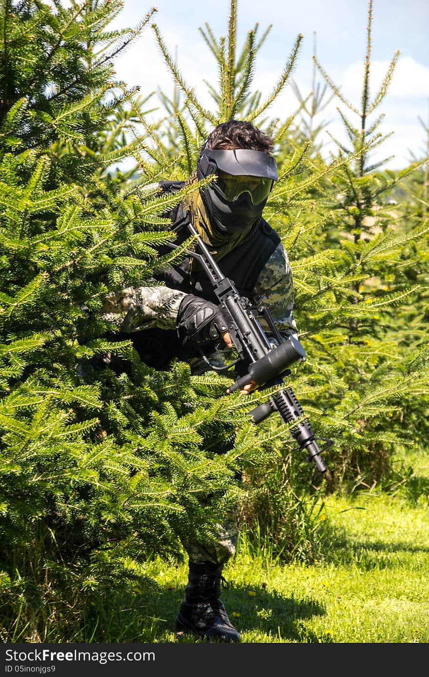 Men playing paintball